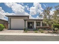 Charming single-story home featuring a two-car garage, covered porch, and well-maintained landscaping at , Henderson, NV 89011