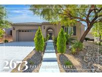 Charming single-story home with a well-manicured front yard and inviting entrance at 2673 Paris Amour St, Henderson, NV 89044