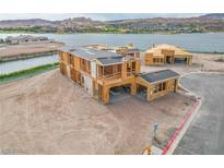 Stunning new construction home with lake views and modern design elements at 65 Bellissima Lago Ct, Henderson, NV 89011