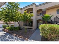 Charming condo featuring well maintained exterior, mature trees and landscaped grounds at 7885 W Flamingo Rd # 1161, Las Vegas, NV 89147
