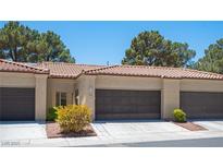 Inviting single-story home featuring a well-maintained exterior, desert landscaping and attached garage at 7911 Canoe Ln, Las Vegas, NV 89145