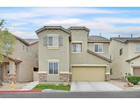 Charming two-story home featuring a well-manicured lawn and attached two-car garage at 8335 Martinborough Ave, Las Vegas, NV 89131