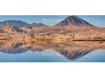 Scenic lake view with mountain background, reflecting the sky and landscape in the calm water at 15 Via Mantova # 401, Henderson, NV 89011