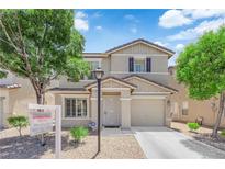 Charming two-story home with a well-manicured lawn and a classic architectural design at 7257 Early Pioneer Ave, Las Vegas, NV 89129