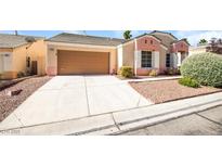 Charming single-story home with a two car garage and desert landscaping at 8205 Harrogate Ave, Las Vegas, NV 89129