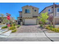 Charming two-story home features a two-car garage, landscaped yard and inviting curb appeal in a desirable location at 8958 Howell St, Las Vegas, NV 89166