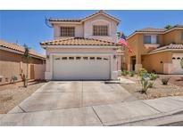 Charming two-story home featuring a well-maintained front yard with xeriscape landscaping at 2180 Polynesia Cir, Henderson, NV 89074