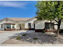 Charming single-story home featuring a well-maintained front yard and desert landscaping at 5422 Nestled Moon Ct, Las Vegas, NV 89131