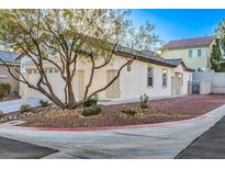 Charming single-story home with desert landscaping and a tree in the front yard at 7849 Montour Falls St, Las Vegas, NV 89149