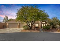 Charming single-story home featuring a three-car garage and mature landscaping at 8356 Shady Lady Ct, Las Vegas, NV 89131