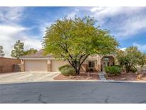 Charming single-story home featuring a well-manicured lawn and a spacious three car garage at 8356 Shady Lady Ct, Las Vegas, NV 89131