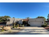 Charming single-story home featuring desert landscaping, stucco walls, and a two-car garage at 853 Morning Sun Ct, Las Vegas, NV 89110