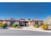Charming single story home featuring mature landscaping, a brick driveway, and a tile roof at 12168 Dorada Coast Ave, Las Vegas, NV 89138