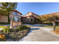 Beautiful fitness and activities building with lush landscaping, and a welcoming entrance at 2244 Shadow Canyon Dr, Henderson, NV 89044