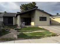 Charming single-story home with an unfinished lawn and a covered front porch perfect for enjoying the outdoors at 4820 Mahogany Dr, Las Vegas, NV 89110