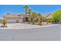 Charming single story home with desert landscaping, circular driveway, and three car garage at 6224 Red Pine Ct, Las Vegas, NV 89130