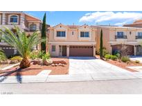 Charming two-story home with a well-maintained lawn and a two-car garage at 6821 Treble Clef Ave, Las Vegas, NV 89139