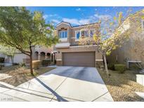 Charming two-story home with a well-maintained front yard and attached two-car garage at 6837 Dragonfly Rock St, Las Vegas, NV 89148