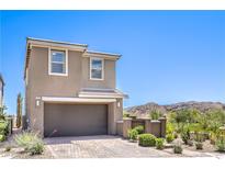Charming two-story home with a two-car garage and mountain views at 12536 Blissful Sky St, Las Vegas, NV 89138