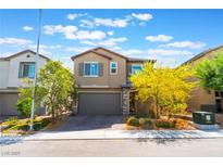 Charming two-story home featuring a two-car garage, desert landscaping, and a welcoming facade at 2964 Gunnery Forge St, Las Vegas, NV 89156