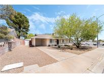 Charming single-story home with a well-maintained front yard and driveway at 429 Scenic Dr, Henderson, NV 89002