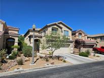 Charming two-story home with manicured landscaping and a two-car garage at 8345 Mozley Park St, Las Vegas, NV 89113