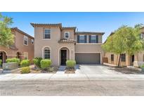 Inviting two-story home with a well-maintained front yard and a two-car garage at 7115 Hickory Post Ave, Las Vegas, NV 89179