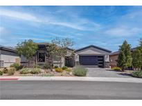 Beautiful single-story home with stone accents and well-maintained landscaping at 7416 Deschutes Cir, Las Vegas, NV 89129