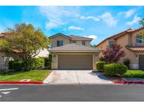 Charming two-story home featuring well-maintained landscaping, a two-car garage, and a welcoming entrance at 9360 Canalino Dr, Las Vegas, NV 89134