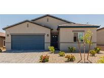 Charming single-story home featuring desert landscaping and a gray two-car garage at 10257 Sequoia Falls Pl, Las Vegas, NV 89149
