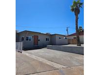 Charming single-story home with modern design elements and desert landscaping at 131 Copper St, Henderson, NV 89015