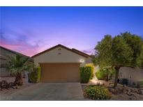 Charming single-story home with a well-maintained front yard and an inviting garage at 2158 Indigo Creek Ave, Henderson, NV 89012