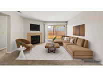 Comfortable living room features a fireplace, contemporary furnishings and opens to the outside deck at 2200 S Fort Apache Rd # 1033, Las Vegas, NV 89117