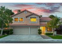 Charming two-story home with a well-manicured lawn and a two-car garage at 2232 Le Conte Ave, Henderson, NV 89074