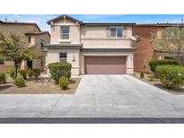 Inviting two-story home with a well-maintained front yard and attached two-car garage at 3638 Via Messina, Henderson, NV 89052