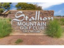 Stallion Mountain Golf Club welcomes visitors with its stone sign, evoking a sense of community and prestige at 4037 Vulcan St, Las Vegas, NV 89122