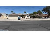 Charming single-story home with a well-maintained front yard and a classic design at 5170 S Pearl St, Las Vegas, NV 89120