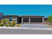Charming single-story home with a spacious three-car garage and well-maintained landscaping at 6250 Lamont Hills Ave, Las Vegas, NV 89139