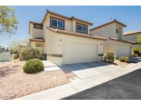Charming two-story home features a two-car garage and neutral-toned stucco exterior at 795 Kiska Ave, Las Vegas, NV 89123