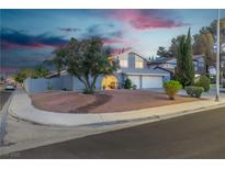 Charming two-story home featuring an attached two-car garage and well-maintained landscaping at 1808 Piccolo Way, Las Vegas, NV 89146