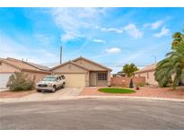 Charming single-story home with desert landscaping and a two car garage at 2319 Little Italy Ave, North Las Vegas, NV 89031