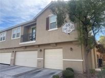 Attractive townhouse with attached garage and a small balcony perfect for relaxing at 6255 W Arby Ave # 239, Las Vegas, NV 89118
