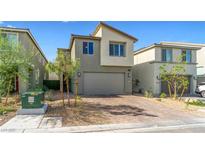 Charming two-story home featuring a two-car garage and a stylish brick driveway at 8021 Adelaide Hills St, Las Vegas, NV 89113