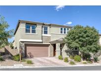 Charming two-story home showcasing a well-maintained yard and a welcoming two car garage at 888 Cherry Glen Pl, Las Vegas, NV 89138
