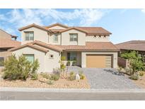 Charming two-story home with a well-manicured front yard and a modern garage door at 212 Harris Peak St, Las Vegas, NV 89138