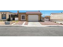 Charming single-story home featuring a well-maintained front yard, and a two car garage at 2337 Sierra Sunrise St, Las Vegas, NV 89156