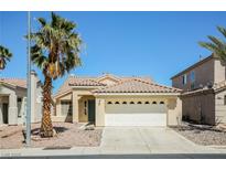 Charming single-story home with desert landscaping and a two-car garage at 3416 Steppe St, North Las Vegas, NV 89032