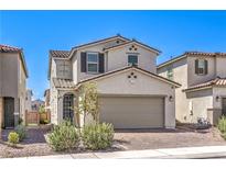 Charming two-story home with a two car garage and brick paved driveway at 4145 Nopal Serrano Ave, Las Vegas, NV 89141