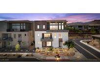 Beautiful two-story home featuring modern architectural elements and desert landscaping at 4153 Solace St, Las Vegas, NV 89135