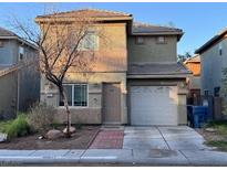 Charming two-story home featuring an attached garage, complemented by low maintenance landscaping at 5281 Starter Ave, Las Vegas, NV 89156